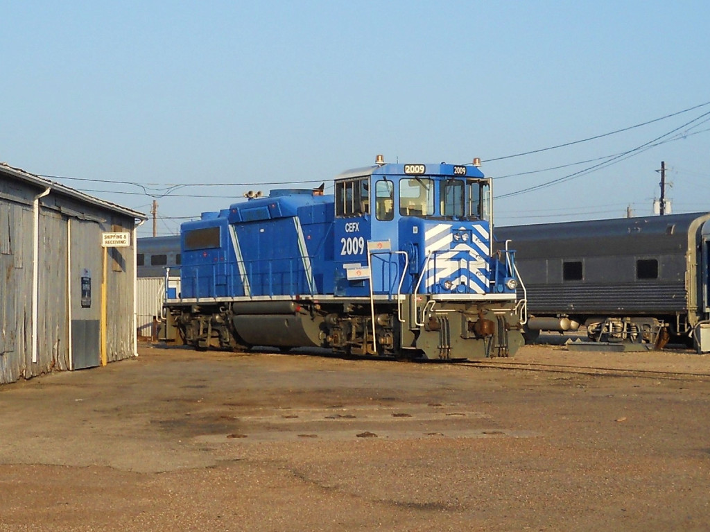 CEFX 2009  28May2011  Hiding out back at WabTec - the old HBT Engine Shop - on Milby Street 